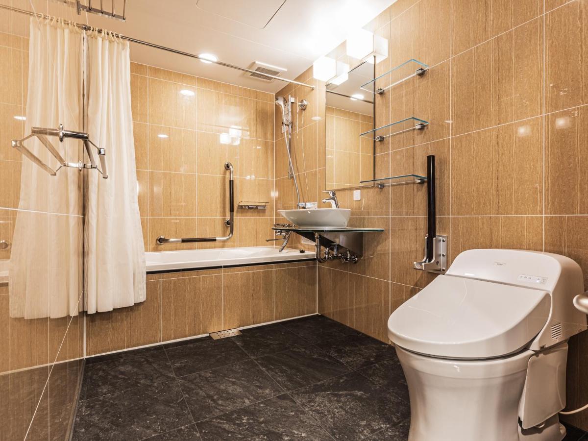 Apa Hotel Shin Osaka Esaka Ekimae Szuita Kültér fotó