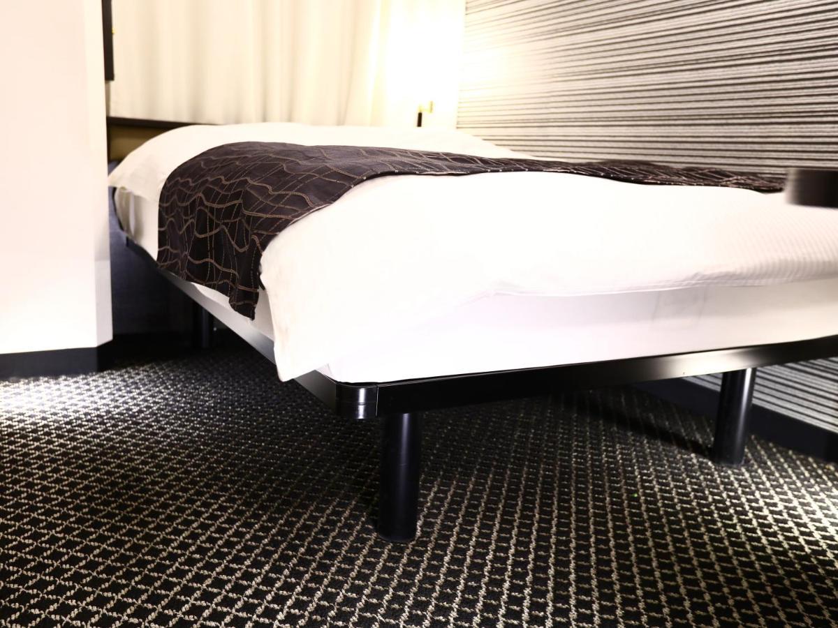 Apa Hotel Shin Osaka Esaka Ekimae Szuita Kültér fotó