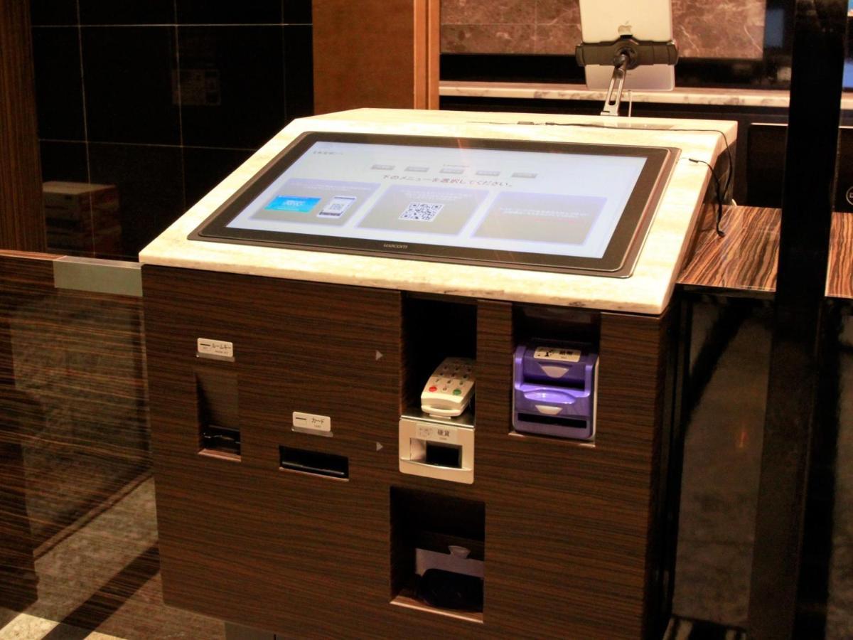 Apa Hotel Shin Osaka Esaka Ekimae Szuita Kültér fotó