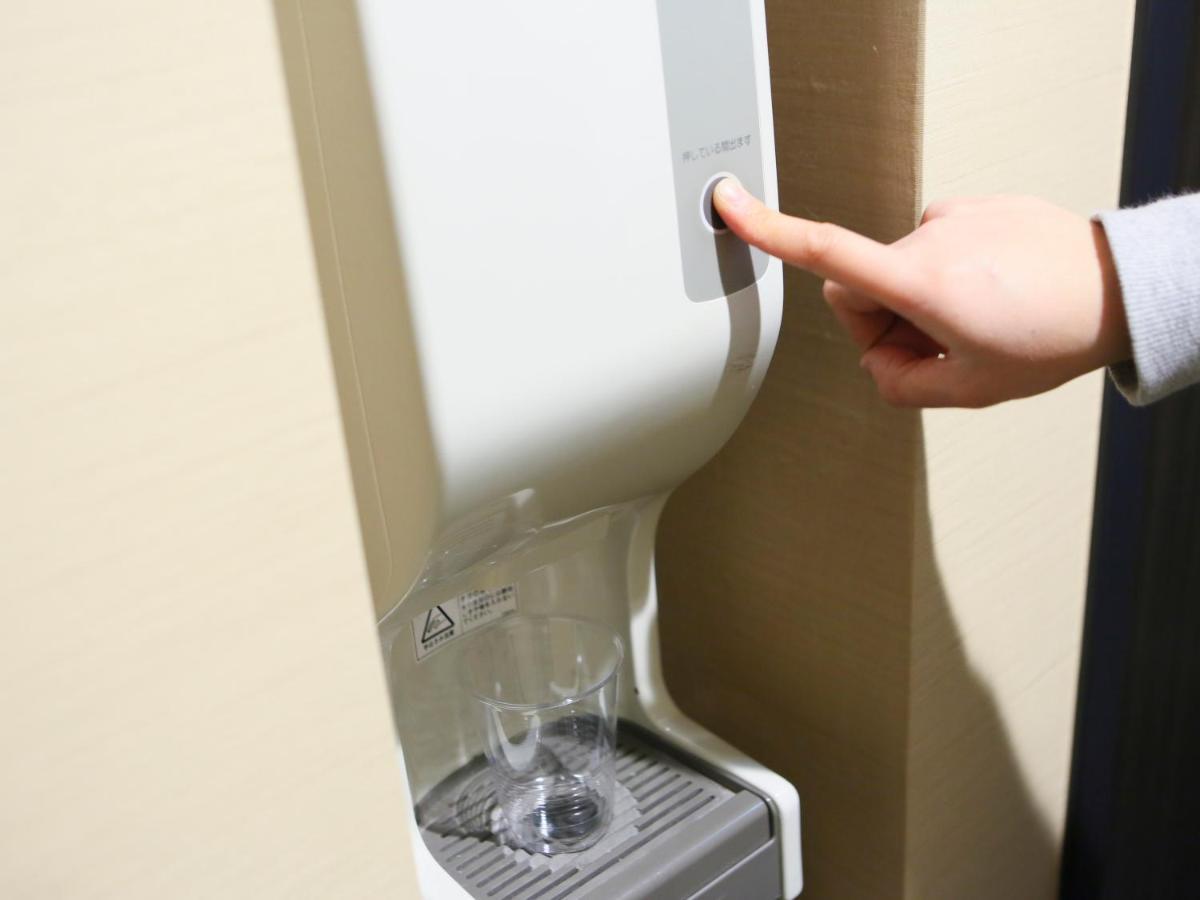 Apa Hotel Shin Osaka Esaka Ekimae Szuita Kültér fotó
