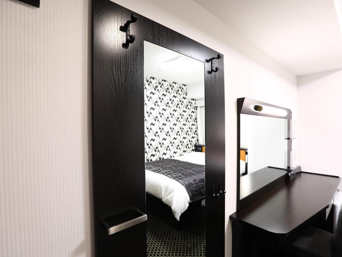 Apa Hotel Shin Osaka Esaka Ekimae Szuita Kültér fotó